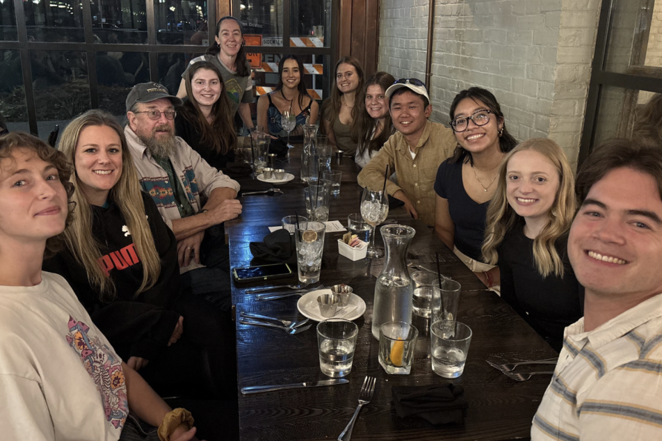 Apprentices and staff gathered at dinner