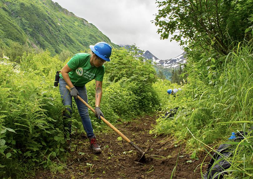 Volunteer working on trail maintenence