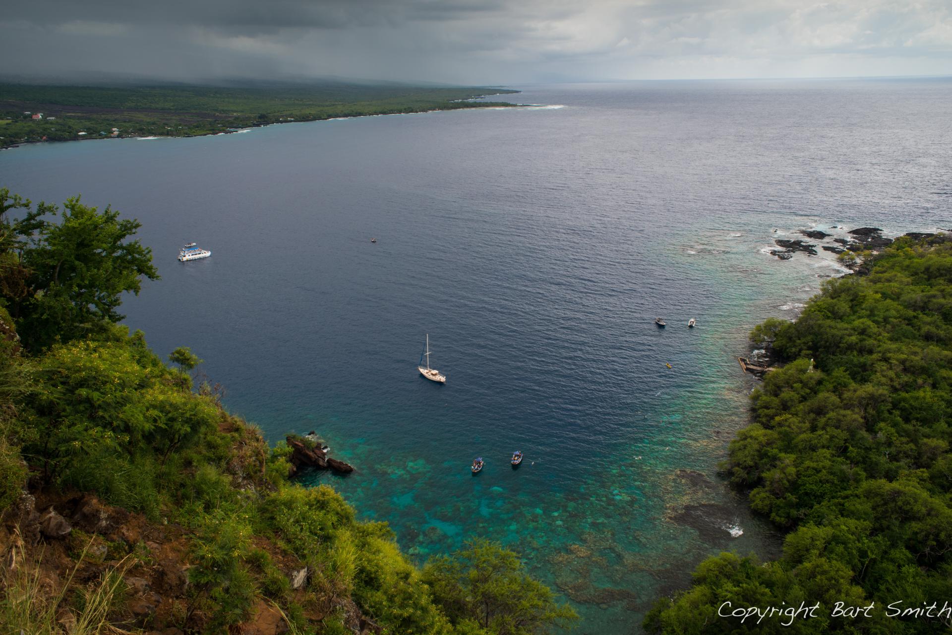Outlook on a cove surrounded by green trees