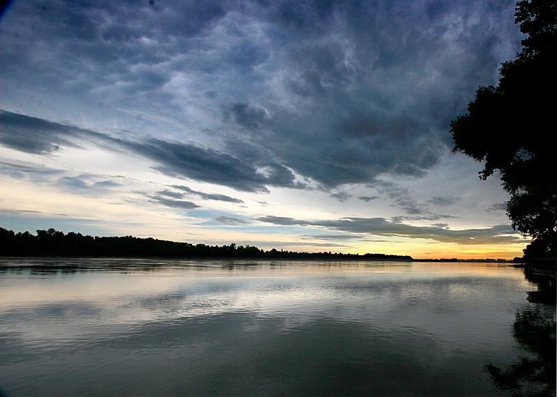 River reflecting a cloudy sky